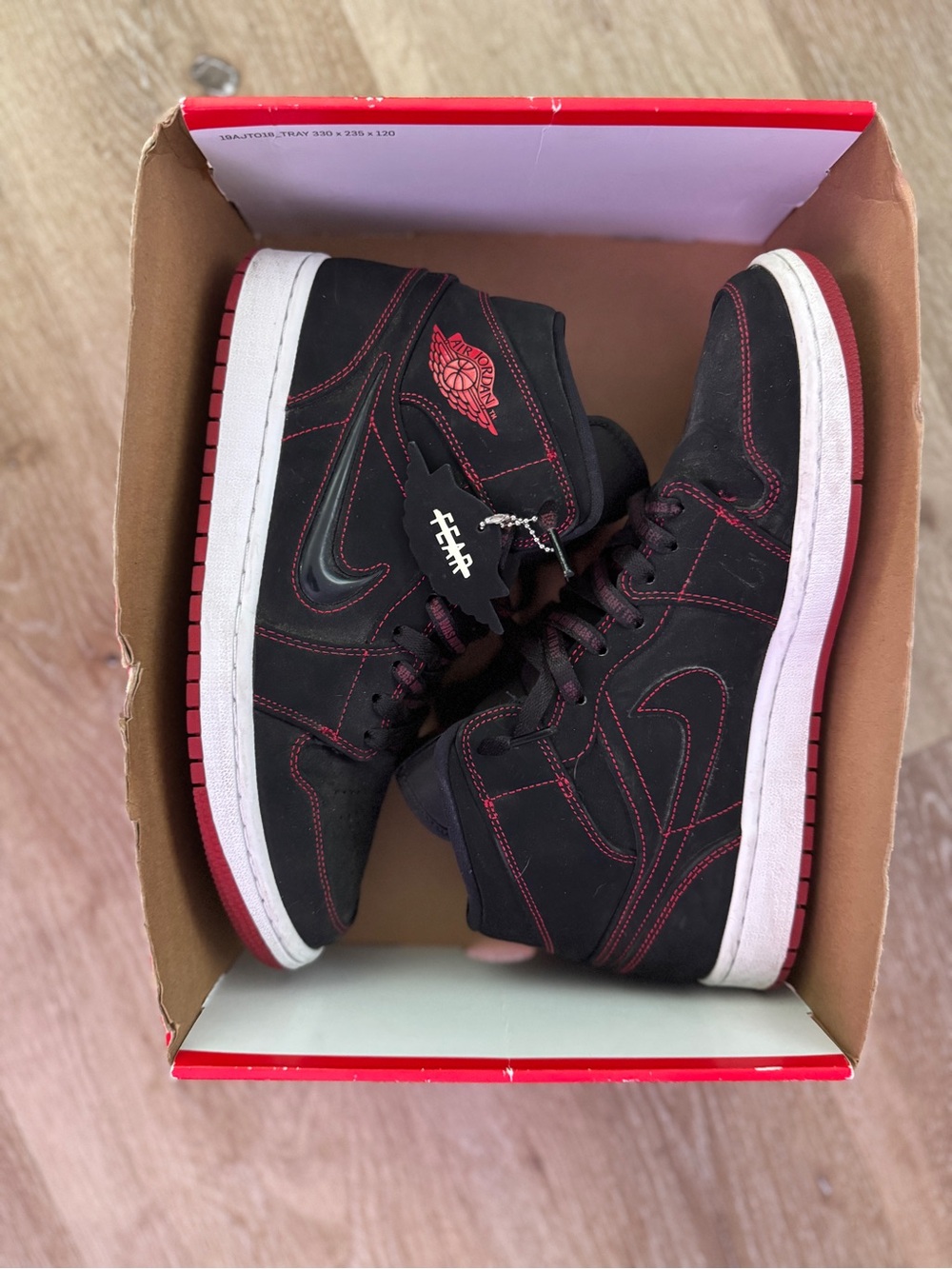 Jordan Black and Red Mid-Top Sneakers